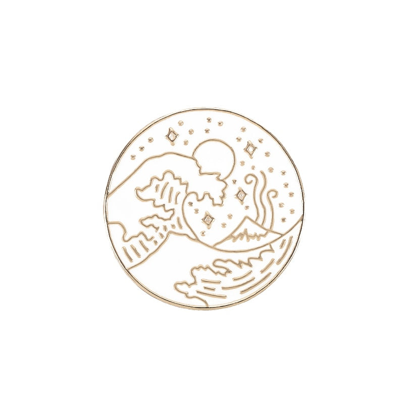 Przypinki z astrologicznym motywem